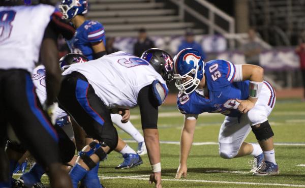 High school athlete Graham Hill, number 50, suffered a concussion in 2013 while playing football at Trinity Christian Academy in Addison, Texas. High school athlete Graham Hill, number 50, suffered a concussion in 2013 while playing football at Trinity Christian Academy in Addison, Texas.