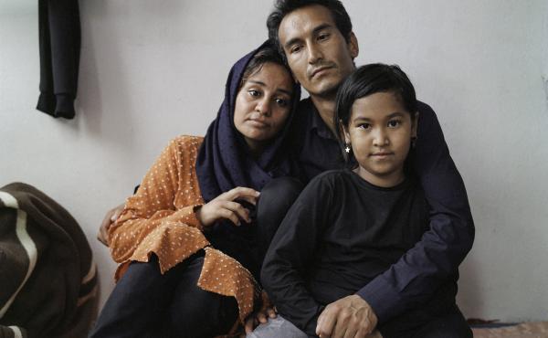 Sayyid Ali Hussaini (center), his wife Mahbube and daughter Elisa sit together in the Turkish city of Trabzon. Originally from the northern Afghan city of Mazar-e-Sharif, the family fled Taliban advances over the summer and arrived in Turkey last month. Sayyid Ali Hussaini (center), his wife Mahbube and daughter Elisa sit together in the Turkish city of Trabzon. Originally from the northern Afghan city of Mazar-e-Sharif, the family fled Taliban advances over the summer and arrived in Turkey last month.