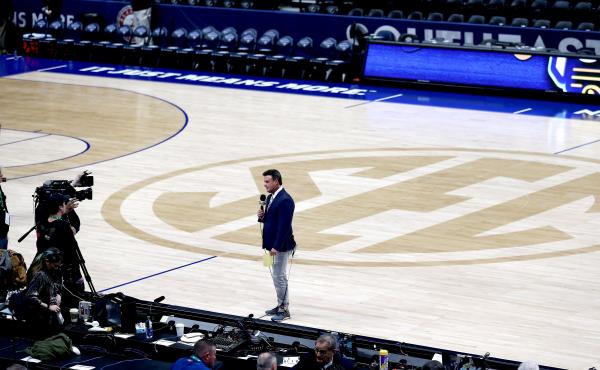 ESPN's Karl Ravech reports on the cancellation of the SEC Men's Basketball Tournament on March 12, in Nashville. With no live sports to show, the network is scrambling to fill the time. Its offerings now include diversions like cherry pit spitting and mar ESPN's Karl Ravech reports on the cancellation of the SEC Men's Basketball Tournament on March 12, in Nashville. With no live sports to show, the network is scrambling to fill the time. Its offerings now include diversions like cherry pit spitting and mar