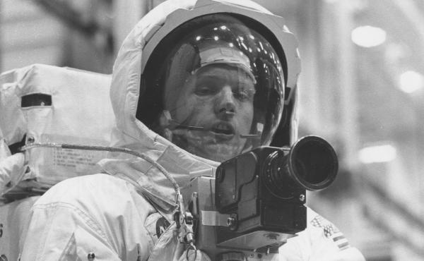 Neil Armstrong tests out his spacesuit and camera in April 1969, three months before he would actually set foot on the moon. Neil Armstrong tests out his spacesuit and camera in April 1969, three months before he would actually set foot on the moon.