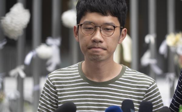 Pro-democracy party activist Nathan Law speaks to the media outside Hong Kong's Legislative Council building last year. Pro-democracy party activist Nathan Law speaks to the media outside Hong Kong's Legislative Council building last year.