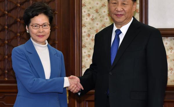 Hong Kong Chief Executive Carrie Lam shakes hands with Chinese President Xi Jinping in a gesture of solidarity Monday in Beijing. Hong Kong Chief Executive Carrie Lam shakes hands with Chinese President Xi Jinping in a gesture of solidarity Monday in Beijing.