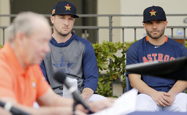 Houston Astros players Alex Bregman and José Altuve look on as owner Jim Crane addresses reporters during a news conference Thursday in West Palm Beach, Fla. Houston Astros players Alex Bregman and José Altuve look on as owner Jim Crane addresses reporters during a news conference Thursday in West Palm Beach, Fla.