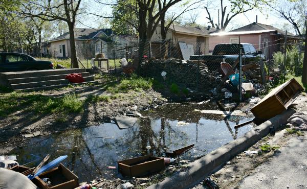 Standing water and abandoned tires make Houston's Fifth Ward hospitable for mosquitoes. Standing water and abandoned tires make Houston's Fifth Ward hospitable for mosquitoes.