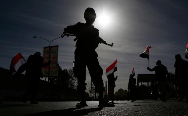 A Houthi soldier stands guard during a rally to mark the fourth anniversary of the war in Yemen on March 26, 2019 in Sana'a, Yemen. A Houthi soldier stands guard during a rally to mark the fourth anniversary of the war in Yemen on March 26, 2019 in Sana'a, Yemen.