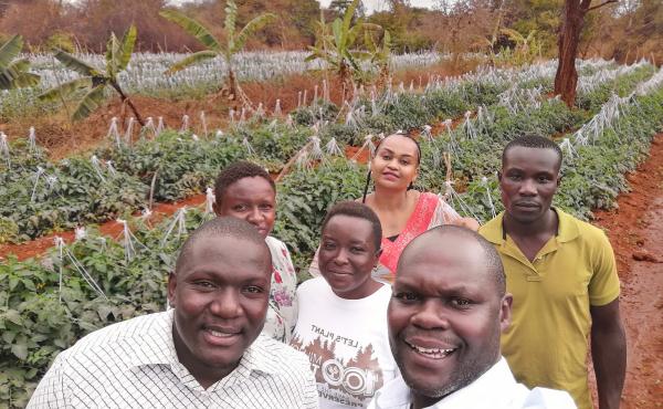 Noah Nasiali-Kadima, foreground, takes a selfie with members of the Africa Farmers Group during a tour of a member's farm in Machakos County, Kenya. Noah Nasiali-Kadima, foreground, takes a selfie with members of the Africa Farmers Group during a tour of a member's farm in Machakos County, Kenya.
