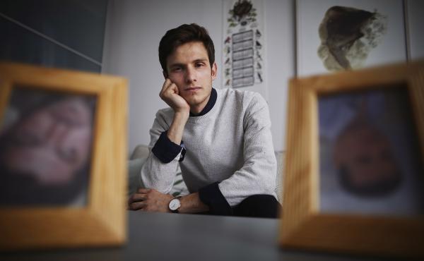 Omar Alshogre, a Syrian refugee who was tortured as a political prisoner in Syria, now lives in Sweden. He has framed photos of men who he says tortured him that he keeps upside down. Omar Alshogre, a Syrian refugee who was tortured as a political prisoner in Syria, now lives in Sweden. He has framed photos of men who he says tortured him that he keeps upside down.