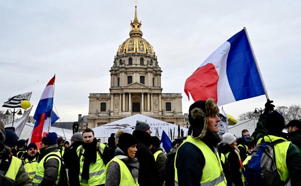 Protesters take part in an antigovernment yellow vest demonstration in front of the Hôtel National des Invalides in Paris early in January. Protesters take part in an antigovernment yellow vest demonstration in front of the Hôtel National des Invalides in Paris early in January.