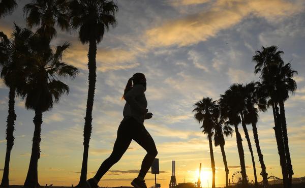 A jogger runs on Santa Monica State Beach on April 10 in Santa Monica, Calif. Running is one form of exercise that meets social distancing guidelines. A jogger runs on Santa Monica State Beach on April 10 in Santa Monica, Calif. Running is one form of exercise that meets social distancing guidelines.