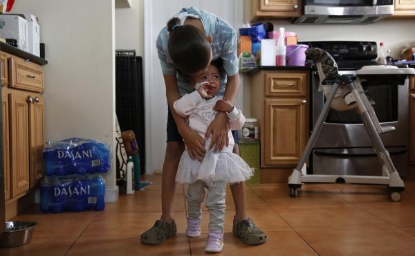 Kai worries he could give COVID-19 to his 2-year-old sister, Alaina. She was born with a heart condition, Down syndrome and a fragile immune system. Kai worries he could give COVID-19 to his 2-year-old sister, Alaina. She was born with a heart condition, Down syndrome and a fragile immune system.