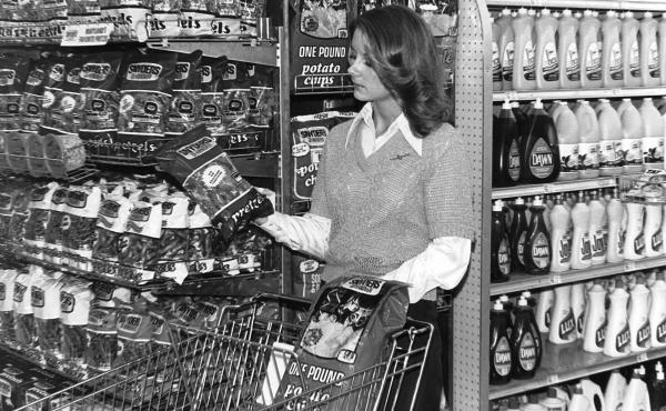 A woman shopping in the 1970s picks up a bag of Snyder's pretzels. Today, Hanover remains a center of snack food manufacturing, even as the food industry changes around it. A woman shopping in the 1970s picks up a bag of Snyder's pretzels. Today, Hanover remains a center of snack food manufacturing, even as the food industry changes around it.