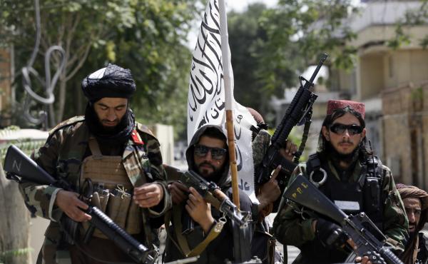 Taliban fighters patrol through Kabul, Afghanistan, on Thursday. Pictures of such fighters posing with captured aircraft, weapons and vehicles have been showing upon social media. Taliban fighters patrol through Kabul, Afghanistan, on Thursday. Pictures of such fighters posing with captured aircraft, weapons and vehicles have been showing upon social media.