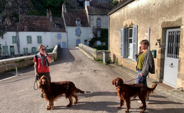 Yuri Mazurenko and Macha Levitin get ready to go on a walk with their dogs Rolly and Safra in a village in Burgundy, France. Yuri Mazurenko and Macha Levitin get ready to go on a walk with their dogs Rolly and Safra in a village in Burgundy, France.