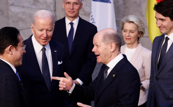 From left, Japan's Prime Minister Fumio Kishida, U.S. President Joe Biden and Germany's Chancellor Olaf Scholz speak as NATO Secretary General Jens Stoltenberg, back, European Commission President Ursula von der Leyen, and Canada's Prime Minister Justin T From left, Japan's Prime Minister Fumio Kishida, U.S. President Joe Biden and Germany's Chancellor Olaf Scholz speak as NATO Secretary General Jens Stoltenberg, back, European Commission President Ursula von der Leyen, and Canada's Prime Minister Justin T