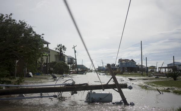 Damaged homes sit among floodwaters after Hurricane Laura passed through the area Thursday in Holly Beach, La. Damaged homes sit among floodwaters after Hurricane Laura passed through the area Thursday in Holly Beach, La.