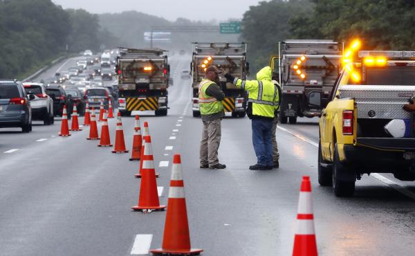 Traffic on Interstate 95 was diverted for hours after a group of armed men fled from police near Wakefield, Mass. on Saturday. Massachusetts state police say 11 suspects have been taken into custody. Traffic on Interstate 95 was diverted for hours after a group of armed men fled from police near Wakefield, Mass. on Saturday. Massachusetts state police say 11 suspects have been taken into custody.