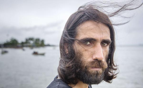 Behrouz Boochani, seen last year at the Australian detention center on Manus Island, Papua New Guinea, where the Kurdish-Iranian asylum-seeker spent years seeking his freedom. On Thursday, the prize-winning author touched down in New Zealand on his way to Behrouz Boochani, seen last year at the Australian detention center on Manus Island, Papua New Guinea, where the Kurdish-Iranian asylum-seeker spent years seeking his freedom. On Thursday, the prize-winning author touched down in New Zealand on his way to