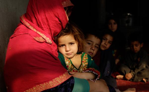 Shaista sits in her tiny home on the outskirts of Kabul. Her youngest, a 3-year-old girl, sits on her lap; some of her other seven children sit beside her. Behind them, she is boiling a pot of water on the wood-burning stove. But she's told the children i Shaista sits in her tiny home on the outskirts of Kabul. Her youngest, a 3-year-old girl, sits on her lap; some of her other seven children sit beside her. Behind them, she is boiling a pot of water on the wood-burning stove. But she's told the children i