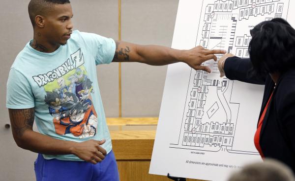Joshua Brown answers questions from prosecutors while pointing to a map of the South Side Flats apartment complex during the murder trial of former Dallas police officer Amber Guyger. Ten days after his testimony, Brown was found shot to death. Joshua Brown answers questions from prosecutors while pointing to a map of the South Side Flats apartment complex during the murder trial of former Dallas police officer Amber Guyger. Ten days after his testimony, Brown was found shot to death.