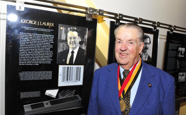 George Laurer in 2011 at the University of Maryland's Innovation Hall of Fame. His many inventions, including the Universal Product Code, led to his induction into the hall in 1991. George Laurer in 2011 at the University of Maryland's Innovation Hall of Fame. His many inventions, including the Universal Product Code, led to his induction into the hall in 1991.