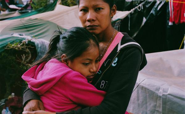 Karen Paz hugs her daughter, Liliana Saray, 9. They are from San Pedro Sula, Honduras. "I feel free; I feel different," Paz said. "I don't have someone who imposes his views and his ways on me. I am not scared someone will come and attack me, like I used Karen Paz hugs her daughter, Liliana Saray, 9. They are from San Pedro Sula, Honduras. "I feel free; I feel different," Paz said. "I don't have someone who imposes his views and his ways on me. I am not scared someone will come and attack me, like I used