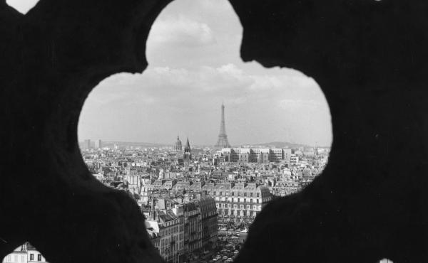 A view of Paris through a detail in the stonework of Notre Dame. A view of Paris through a detail in the stonework of Notre Dame.