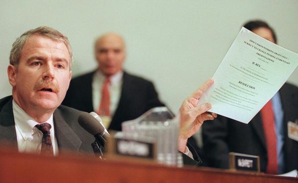 Rep. Tom Barrett, D-Wis., holds a draft copy of the Articles of Impeachment against President Clinton in December 1998. Rep. Tom Barrett, D-Wis., holds a draft copy of the Articles of Impeachment against President Clinton in December 1998.