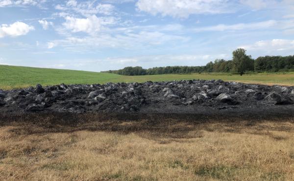 Vandals struck Terry Fuller's farm a few days ago, burning 367 bales of hay. Fuller is trying to limit use of a herbicide called dicamba, which has pitted farmers against each other. Vandals struck Terry Fuller's farm a few days ago, burning 367 bales of hay. Fuller is trying to limit use of a herbicide called dicamba, which has pitted farmers against each other.