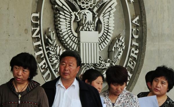 Chinese citizens wait to submit their visa applications at the U.S. Embassy in Beijing in 2012. Wait times for interviews once could stretch to a month or more. Chinese citizens wait to submit their visa applications at the U.S. Embassy in Beijing in 2012. Wait times for interviews once could stretch to a month or more.