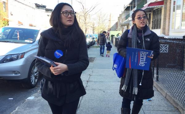 Shiman Shan (left) and Brenda Nguyen canvassed voters for the Bernie Sanders campaign in a New York City neighborhood with a growing Chinese-American community. Shiman Shan (left) and Brenda Nguyen canvassed voters for the Bernie Sanders campaign in a New York City neighborhood with a growing Chinese-American community.