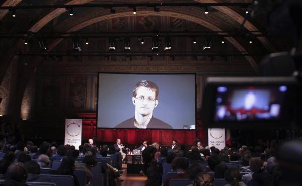 Journalist Barton Gellman's new book, Dark Mirror, focuses on his complicated working relationship with Edward Snowden, the former National Security Agency contractor who leaked the agency's secret surveillance programs. Here, Snowden, who has lived in Mo Journalist Barton Gellman's new book, Dark Mirror, focuses on his complicated working relationship with Edward Snowden, the former National Security Agency contractor who leaked the agency's secret surveillance programs. Here, Snowden, who has lived in Mo