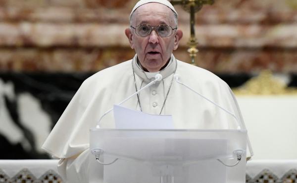 Pope Francis speaks prior to delivering his Urbi et Orbi blessing after celebrating Easter Mass on Sunday at St. Peter's Basilica in the Vatican. Pope Francis speaks prior to delivering his Urbi et Orbi blessing after celebrating Easter Mass on Sunday at St. Peter's Basilica in the Vatican.