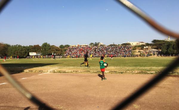 Ethiopian teams Adama City and Welwalo Adigrat University play in a soccer match. Stadiums have become battlefields and teams have become a proxy for the political divisions in the country. Ethiopian teams Adama City and Welwalo Adigrat University play in a soccer match. Stadiums have become battlefields and teams have become a proxy for the political divisions in the country.
