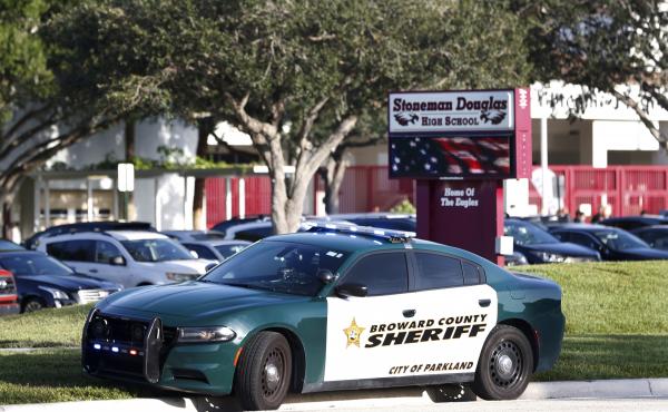 A Broward County Sheriff's Office vehicle is parked outside Marjory Stoneman Douglas High School, in Parkland, Fla. A Broward County Sheriff's Office vehicle is parked outside Marjory Stoneman Douglas High School, in Parkland, Fla.