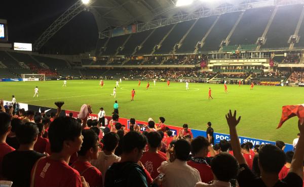 Fans cheer as Hong Kong's soccer team prepares to hit the field. Hong Kong fans have taken to booing China's national anthem in recent years to protest Beijing's tightening grip over the city. China's legislature has now made it illegal to disrespect the Fans cheer as Hong Kong's soccer team prepares to hit the field. Hong Kong fans have taken to booing China's national anthem in recent years to protest Beijing's tightening grip over the city. China's legislature has now made it illegal to disrespect the