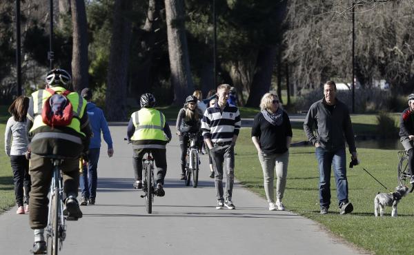 Residents exercise Sunday at Hagley Park in Christchurch, New Zealand. The country's border remains closed to foreign nationals, and New Zealanders returning home are forced to follow a strict 14-day quarantine. Residents exercise Sunday at Hagley Park in Christchurch, New Zealand. The country's border remains closed to foreign nationals, and New Zealanders returning home are forced to follow a strict 14-day quarantine.