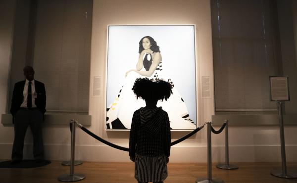 Parker Curry, 4, takes in Amy Sherald's painting of Michelle Obama in the National Portrait Gallery in Washington, D.C. Parker has co-authored a book with her mom called Parker Looks Up: An Extraordinary Moment. Parker Curry, 4, takes in Amy Sherald's painting of Michelle Obama in the National Portrait Gallery in Washington, D.C. Parker has co-authored a book with her mom called Parker Looks Up: An Extraordinary Moment.