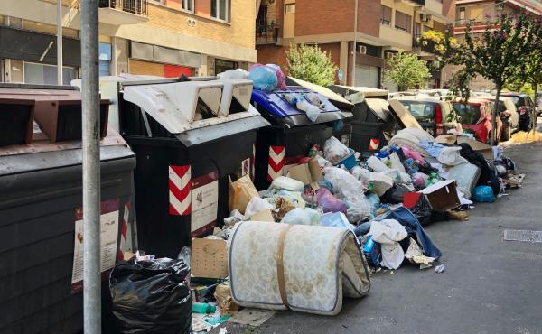 Trash piles in Monteverde, a residential neighborhood in Rome. During this scorching summer, the city's residents and visitors are being tested by a massive trash crisis. Trash piles in Monteverde, a residential neighborhood in Rome. During this scorching summer, the city's residents and visitors are being tested by a massive trash crisis.
