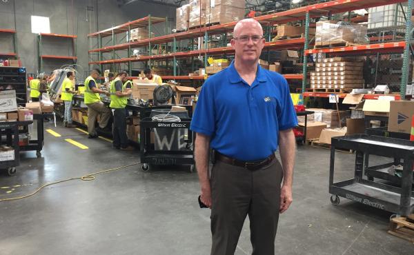 Mark Holohan, solar division manager at Wilson Electric, stands in his company's warehouse outside Phoenix, Ariz. Solar installers say a proposed tariff could sink their business model, while several solar manufacturers say they need shelter from an overs Mark Holohan, solar division manager at Wilson Electric, stands in his company's warehouse outside Phoenix, Ariz. Solar installers say a proposed tariff could sink their business model, while several solar manufacturers say they need shelter from an overs