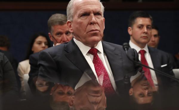 Former CIA Director John Brennan appears before a House hearing in May. He told a public policy conference on Friday that Trump associates should have known better than to meet with a Russian lawyer last year. Former CIA Director John Brennan appears before a House hearing in May. He told a public policy conference on Friday that Trump associates should have known better than to meet with a Russian lawyer last year.