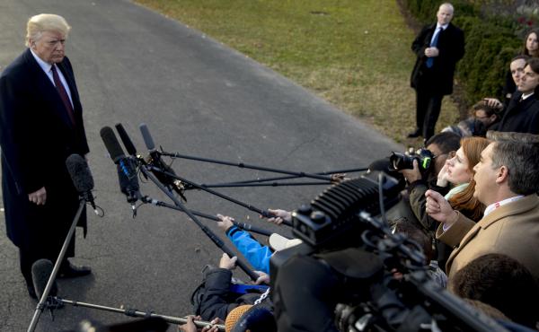 President Donald Trump takes a question from CNN reporter Jim Acosta, right, before boarding Marine One on the South Lawn of the White House in Washington on Nov. 20, 2018. President Donald Trump takes a question from CNN reporter Jim Acosta, right, before boarding Marine One on the South Lawn of the White House in Washington on Nov. 20, 2018.