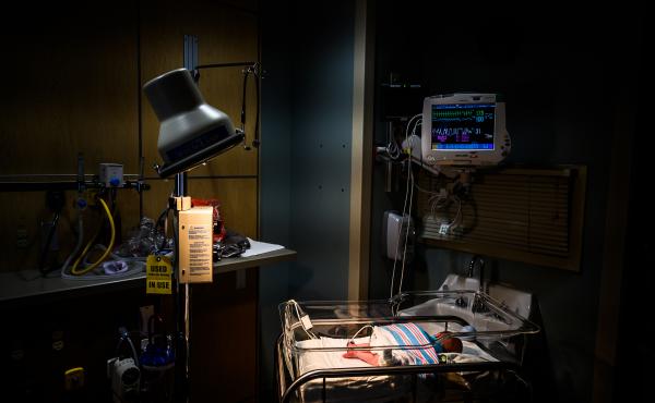 An infant is monitored for opioid withdrawal in a neonatal intensive care unit at the CAMC Women and Children's Hospital in Charleston, W.Va., in June. Infants exposed to opioids in utero often experience symptoms of withdrawal. An infant is monitored for opioid withdrawal in a neonatal intensive care unit at the CAMC Women and Children's Hospital in Charleston, W.Va., in June. Infants exposed to opioids in utero often experience symptoms of withdrawal.