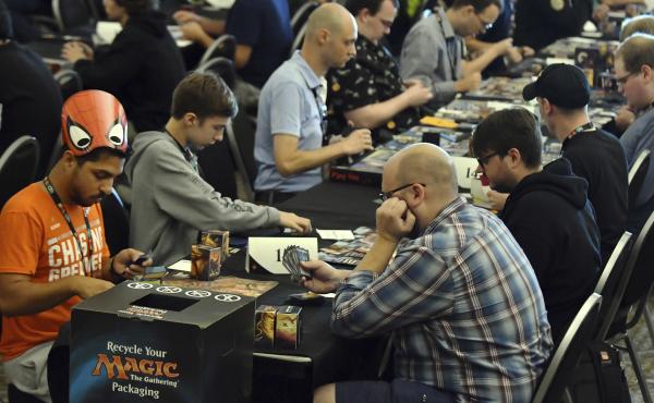 Players compete in a Magic: The Gathering tournament at Hasbro's HASCON in 2017. Players compete in a Magic: The Gathering tournament at Hasbro's HASCON in 2017.