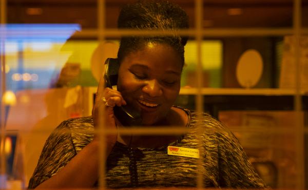 Cortez answers a call from a customer. She's earning $2,000 more a year than she made at her old job. Cortez answers a call from a customer. She's earning $2,000 more a year than she made at her old job.