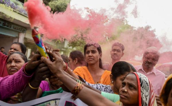People celebrate after police shot dead four detained gang-rape and murder suspects in Shadnagar, near Hyderabad, India, on Friday. People celebrate after police shot dead four detained gang-rape and murder suspects in Shadnagar, near Hyderabad, India, on Friday.