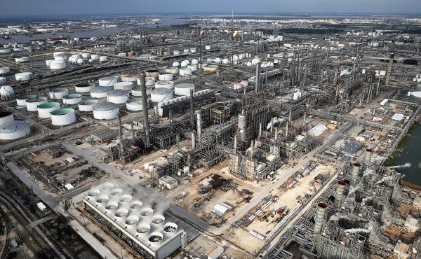 Petrochemical facilities in the Houston area are assessing their hurricane preparedness after Hurricane Harvey. This oil refinery reinforced storage tank roofs with geodesic domes — the gray caps on some of the white tanks in the photo — to better wi Petrochemical facilities in the Houston area are assessing their hurricane preparedness after Hurricane Harvey. This oil refinery reinforced storage tank roofs with geodesic domes — the gray caps on some of the white tanks in the photo — to better wi