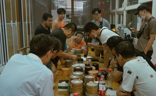 Men crowd over a cricket fight in Beijing in September. Competitive cricket fights are believed to have been held for more than 1,000 years in China. Men crowd over a cricket fight in Beijing in September. Competitive cricket fights are believed to have been held for more than 1,000 years in China.