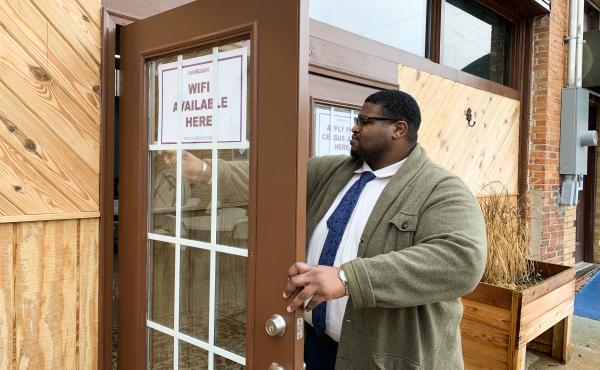 Anthony Hill, Fair Count's communications associate, posts signs encouraging people to use the free Wi-Fi and apply for 2020 census jobs at ARC Community Center in Fort Gaines, Ga. Anthony Hill, Fair Count's communications associate, posts signs encouraging people to use the free Wi-Fi and apply for 2020 census jobs at ARC Community Center in Fort Gaines, Ga.