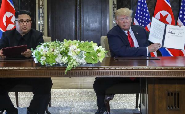 U.S. President Donald Trump holds up a document he and North Korean leader Kim Jong Un signed at the US North Korea summit in Singapore. U.S. President Donald Trump holds up a document he and North Korean leader Kim Jong Un signed at the US North Korea summit in Singapore.
