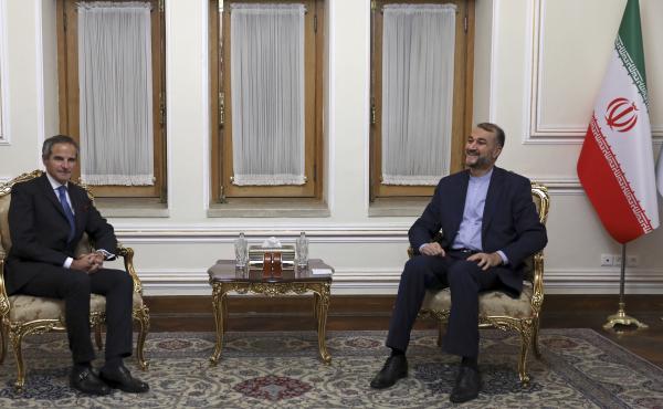 Head of the International Atomic Energy Agency Rafael Mariano Grossi, left, and Iranian Foreign Minister Hossein Amirabdollahian pictured meeting in Tehran, on Tuesday. Grossi pressed for greater access in the Islamic Republic ahead of diplomatic talks re Head of the International Atomic Energy Agency Rafael Mariano Grossi, left, and Iranian Foreign Minister Hossein Amirabdollahian pictured meeting in Tehran, on Tuesday. Grossi pressed for greater access in the Islamic Republic ahead of diplomatic talks re